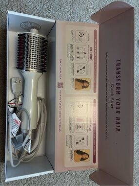 Shark straighten and smooth hair with heat comb technology.